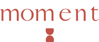 Red MOMent logo with two abstract shapes on a transparent background.